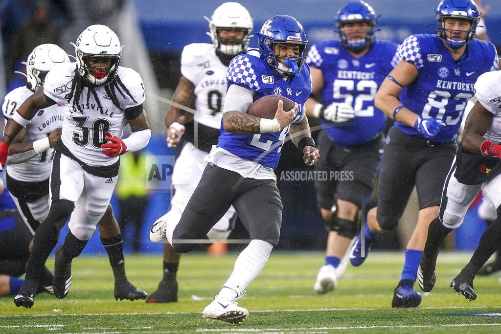 Bryan Woolston Kentucky running back Christopher Rodriguez Jr. (24) runs for a touchdown during the second half of the NCAA college football game against Louisville, Saturday, Nov. 30, 2019, in Lexington, Ky. (AP Photo/Bryan Woolston)