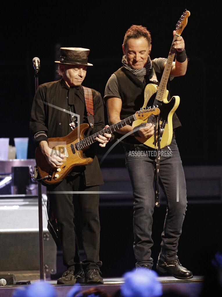 Tony Dejak FILE - Bruce Springsteen, right, performs with Nils Lofgren of The E Street Band in Cleveland on Feb. 23, 2016. Springsteen's latest album, "Letter To You" will be released on Oct. 23. (AP Photo/Tony Dejak, File)