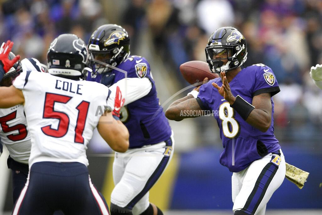 Nick Wass Baltimore Ravens quarterback Lamar Jackson (8) throws a pass against the Houston Texans during the first half of an NFL football game, Sunday, Nov. 17, 2019, in Baltimore. (AP Photo/Nick Wass)