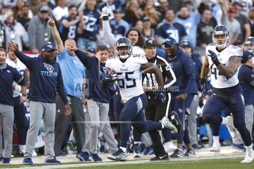 D. Ross Cameron Tennessee Titans inside linebacker Jayon Brown (55) returns a fumble for a touchdown against the Oakland Raiders during the second half of an NFL football game in Oakland, Calif., Sunday, Dec. 8, 2019. (AP Photo/D. Ross Cameron)