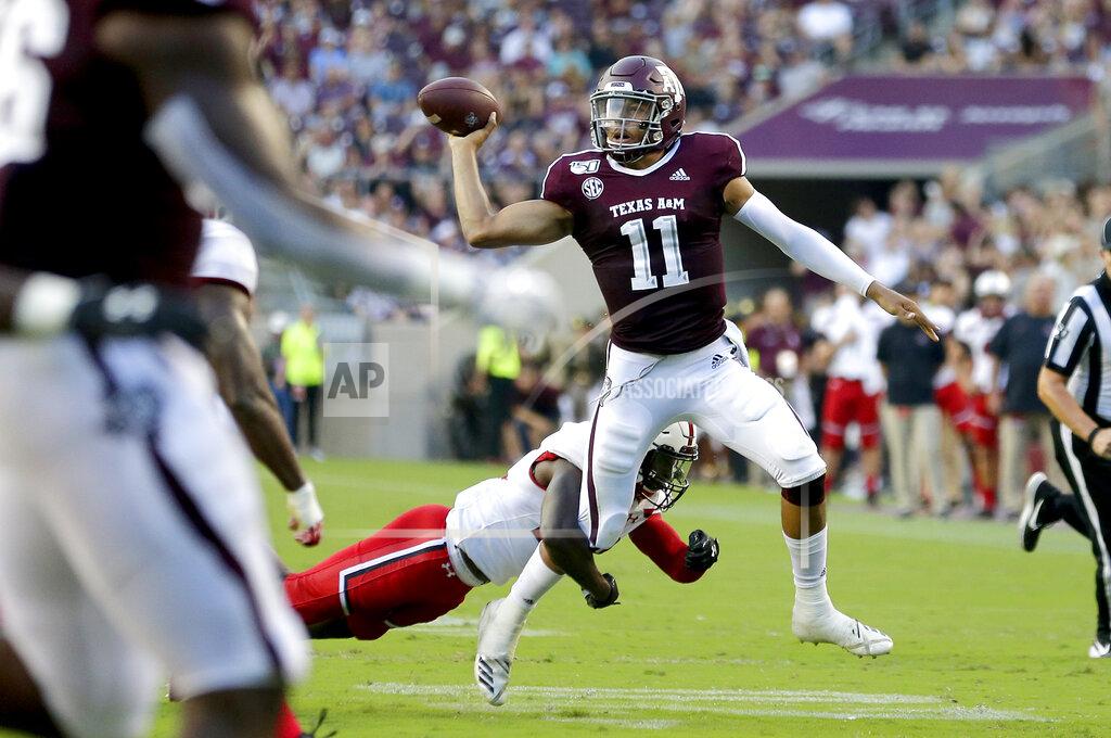 Sam Craft Texas A&M quarterback Kellen Mond (11) looks to pass as Lamar defensive back Andre Mulinax (22) applies pressure during the first half of an NCAA college football game, Saturday, Sept. 14, 2019, in College Station, Texas. (AP Photo/Sam Craft)