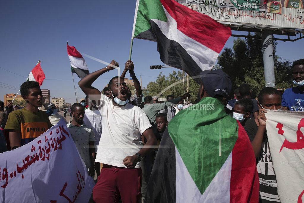 Marwan Ali Thousands of protesters take to the streets to renew their demand for a civilian government in the Sudanese capital Khartoum, Thursday, Nov. 25, 2021. The rallies came just days after the military signed a power-sharing deal with the prime minister, after releasing him from house arrest and reinstating him as head of government. The deal came almost a month after the generals orchestrated a coup. Sudan’s key pro-democracy groups and political parties have dismissed the deal as falling short of their demands for a fully civilian rule. (AP Photo/Marwan Ali)