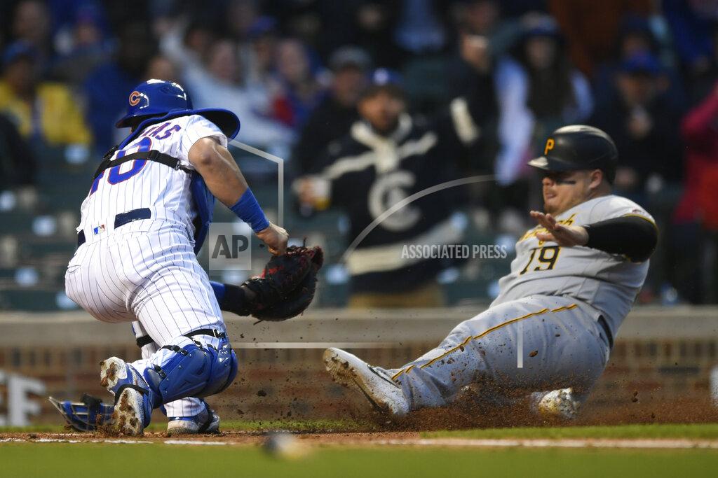Paul Beaty Chicago Cubs catcher Willson Contreras (40) tags out Pittsburgh Pirates' Daniel Vogelbach (19) at home plate during the fourth inning of a baseball game Tuesday, May 17, 2022, in Chicago. (AP Photo/Paul Beaty)