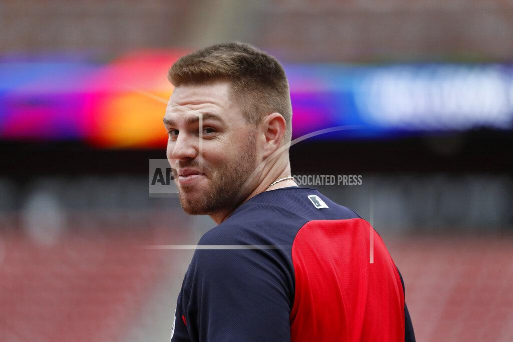 Jeff Roberson FILE - In this Oct. 5, 2019, file photo, Atlanta Braves' Freddie Freeman looks over his shoulder as he enters the batting cage during a baseball workout in St. Louis. Freeman does not know if he has time to be ready for the Braves' opener at the New York Mets. Following a scary journey in his battle with COVID-19, Freeman knows he is grateful to even have a chance. (AP Photo/Jeff Roberson, File)
