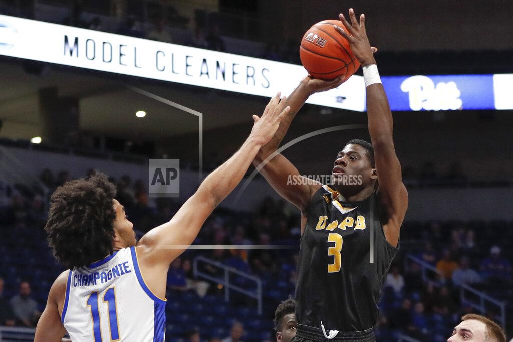 Keith Srakocic Arkansas-Pine Bluff's Markedric Bell (3) shoots over Pittsburgh's Justin Champagnie (11) during the first half of an NCAA college basketball game Thursday, Nov. 21, 2019, in Pittsburgh. (AP Photo/Keith Srakocic)