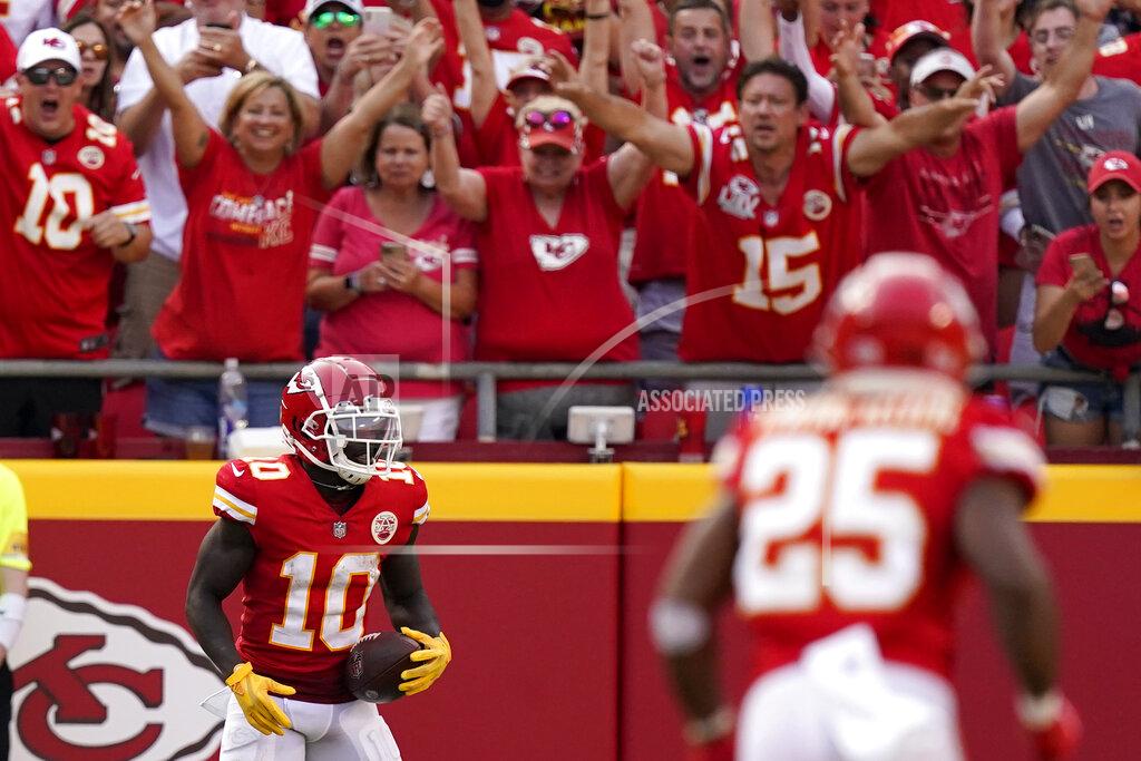 Charlie Riedel Kansas City Chiefs wide receiver Tyreek Hill (10) celebrates after catching a 75-yard pass for a touchdown during the second half of an NFL football game against the Cleveland Browns Sunday, Sept. 12, 2021, in Kansas City, Mo. (AP Photo/Charlie Riedel)