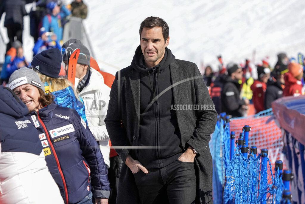 Giovanni Auletta Switzerland's Roger Federer walks in the finish area of an alpine ski, women's World Cup super-G, in Lenzerheide, Switzerland, Saturday, March 5, 2022. (AP Photo/Giovanni Auletta)