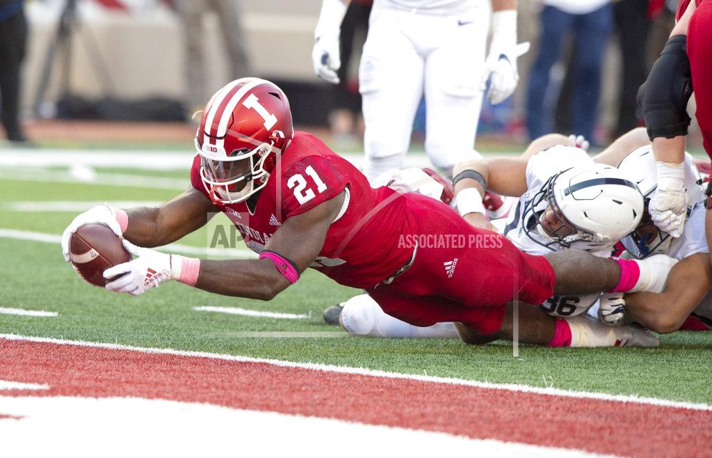 Doug Mcschooler Indiana running back Stevie Scott (21) makes a diving effort to score during the second half of an NCAA college football game against Penn State Saturday, Oct. 20, 2018, in Bloomington, Ind. Penn State won 33-28. (AP Photo/Doug McSchooler)