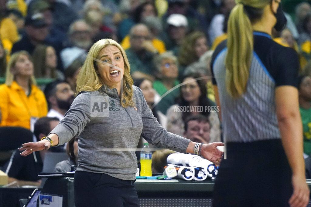 Lm Otero Baylor head coach Nicki Collen, left, questions a call in the final minutes of the second half of a college basketball game against South Dakota in the second round of the NCAA tournament in Waco, Texas, Sunday, March 20, 2022. (AP Photo/LM Otero)