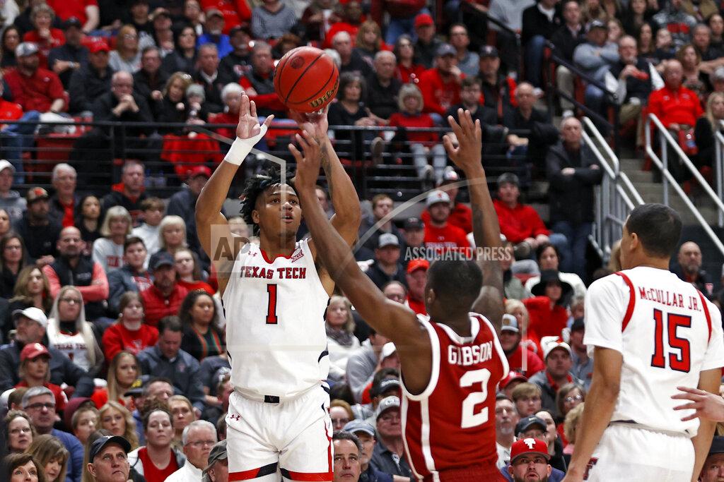 Brad Tollefson Texas Tech's Terrence Shannon Jr. (1) shoots over Oklahoma's Umoja Gibson (2) during the first half of an NCAA college basketball game Tuesday, Feb. 22, 2022, in Lubbock, Texas. (AP Photo/Brad Tollefson)