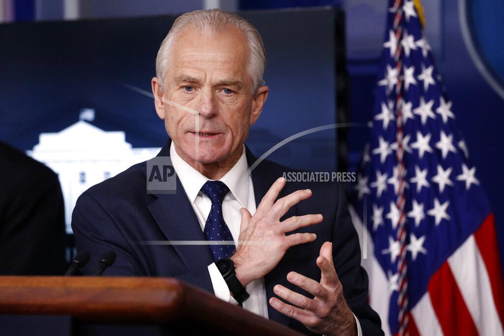 FILE - White House trade adviser Peter Navarro, who is now serving as national defense production act policy coordinator, speaks in the James Brady Press Briefing Room of the White House in Washington on April 2, 2020. USA Today says that Navarro's column about Dr. Anthony Fauci that it solicited and published did not meet its fact-checking standards. Navarro's column, saying that the nation's top infectious disease expert had been wrong about everything he had interacted with him on, ran in Wednesday's newspaper and online a night earlier. USA Today also ran a fact-checking column debunking some of Navarro's claims. (AP Photo/Alex Brandon, File)