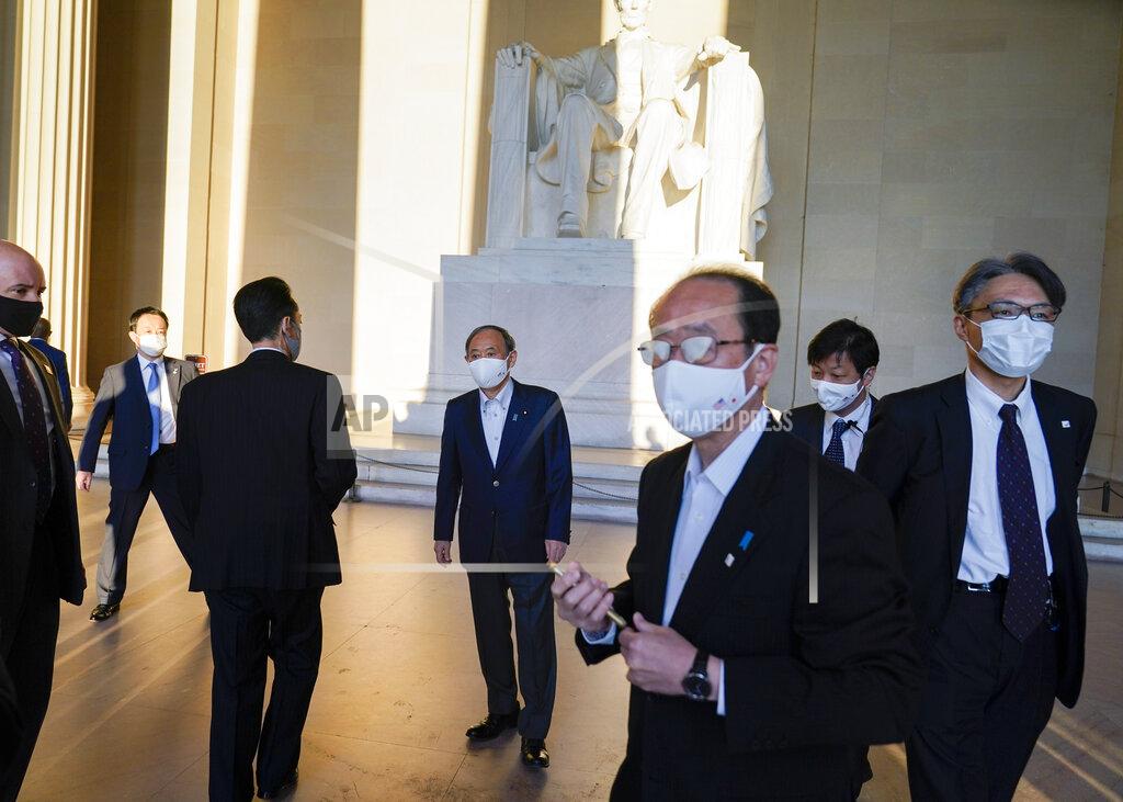 Alex Brandon Japanese Prime Minister Yoshihide Suga visits the Lincoln Memorial, Saturday, April 17, 2021, in Washington. (AP Photo/Alex Brandon)