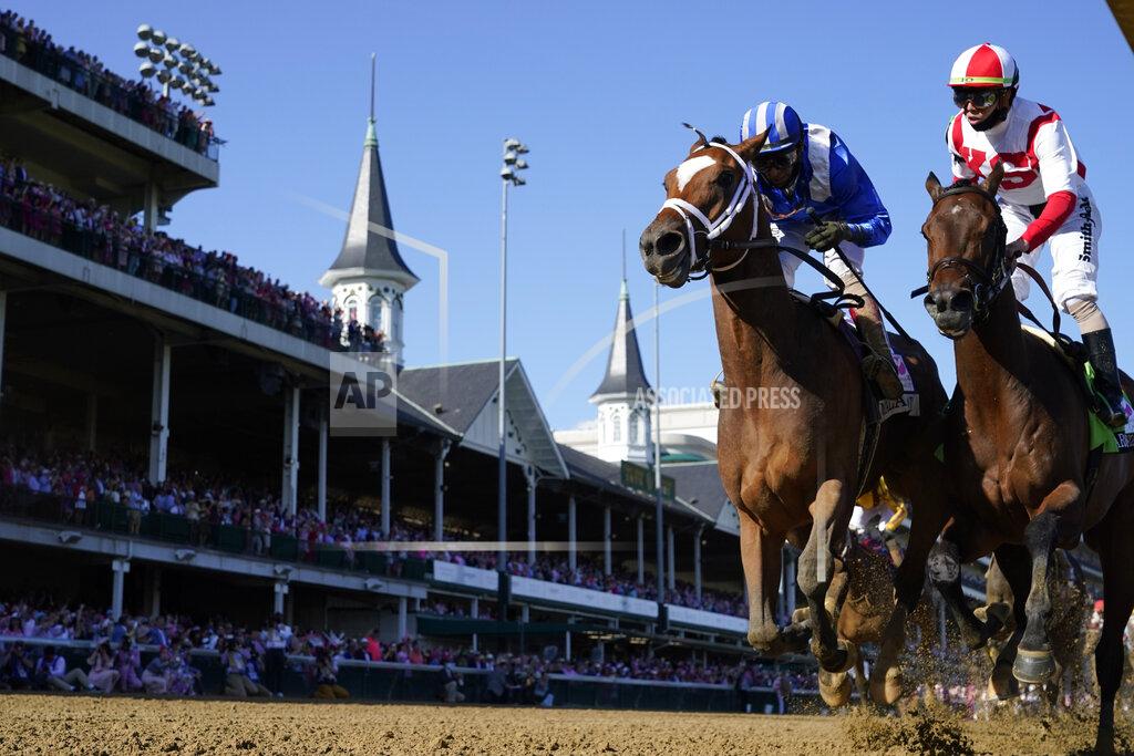 Jeff Roberson John Velazquez, left, rides Malathaat to victory during the 147th running of the Kentucky Oaks at Churchill Downs, Friday, April 30, 2021, in Louisville, Ky. (AP Photo/Jeff Roberson)