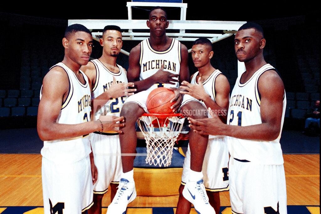 Anonymous FILE - In this November 1991 file photo, Michigan's Fab Five, from left, Jimmy King, Juwan Howard, Chris Webber, Jalen Rose and Ray Jackson pose in Ann Arbor, Mich. Howard is coming back to Michigan.
The former member of the Fab Five agreed to a five-year deal, which will pay him $2 million in his first year, on Wednesday, May 22, 2019, to lead the Wolverines. (AP Photo, File)