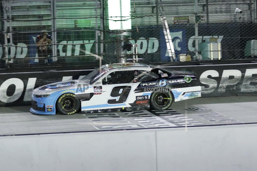 Mark Humphrey Noah Gragson (9) takes the checkered flag to win a NASCAR Xfinity Series auto race at Bristol Motor Speedway Monday, June 1, 2020, in Bristol, Tenn. (AP Photo/Mark Humphrey)