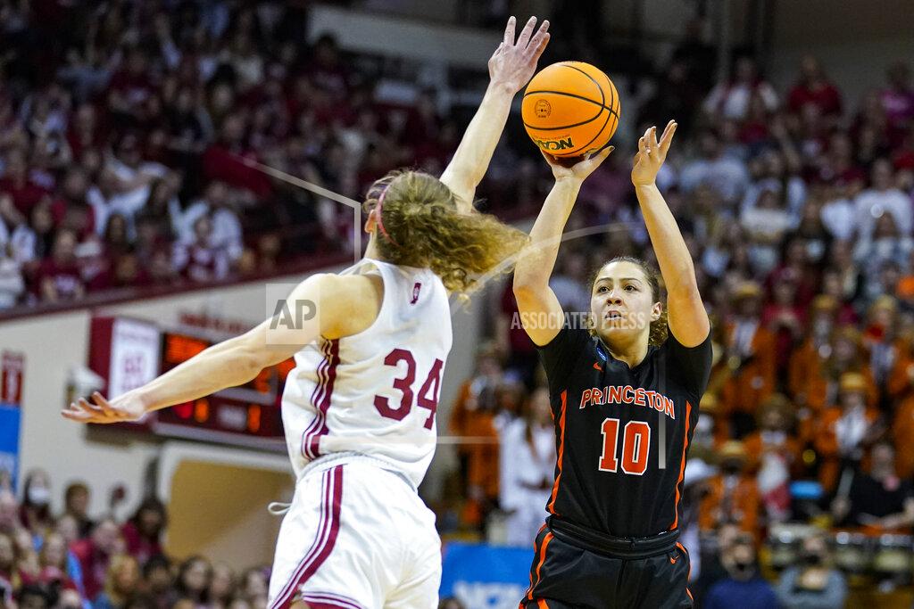 Michael Conroy Princeton guard Grace Stone (10) shoots over Indiana guard Grace Berger (34) in the first half of a college basketball game in the second round of the NCAA tournament in Bloomington, Ind., Monday, March 21, 2022. (AP Photo/Michael Conroy)
