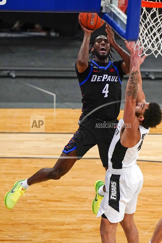 Frank Franklin Ii DePaul's Javon Freeman-Liberty (4) shoots over Providence's Jared Bynum (4) during the first half of an NCAA college basketball game in the Big East conference tournament Wednesday, March 10, 2021, in New York. DePaul won 70-62. (AP Photo/Frank Franklin II)