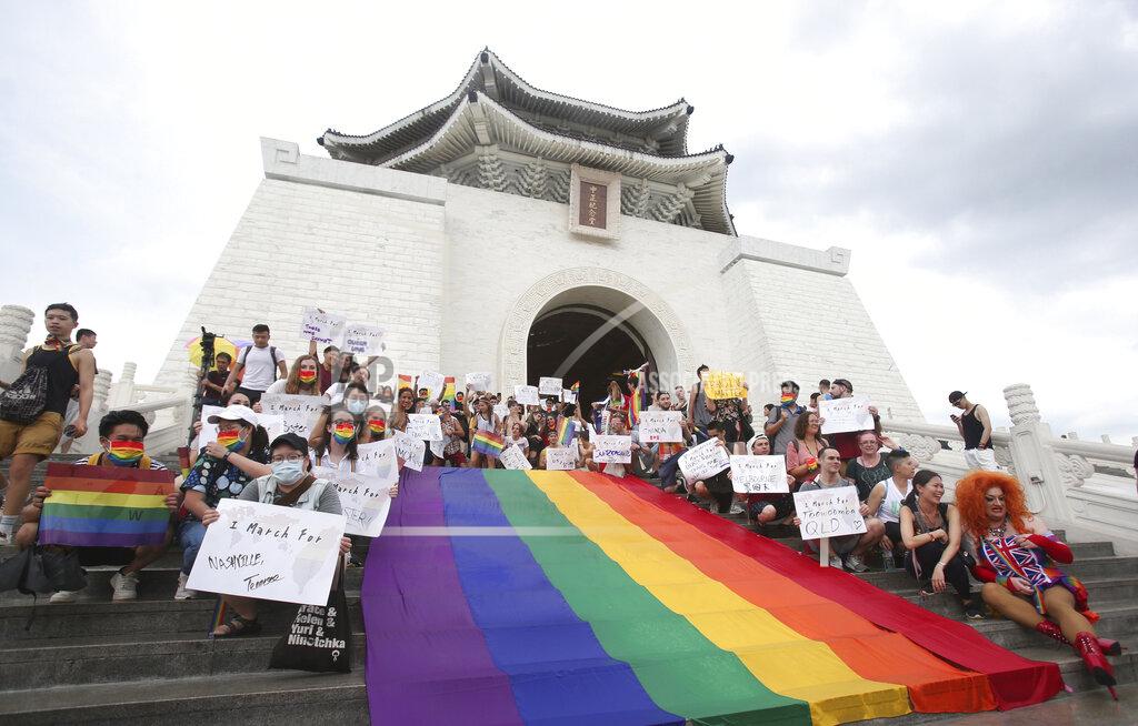 Chiang Ying-Ying Participants rally during the "Taiwan Pride March for the World!" at Liberty Square at the CKS Memorial Hall in Taipei, Taiwan, Sunday, June 28, 2020. This year marks the first Gay Pride march in Chicago 1970, and due to the COVID-19 lockdown, Taiwan is one of the very few countries to host the world's only physical Gay Pride. (AP Photo/Chiang Ying-ying)