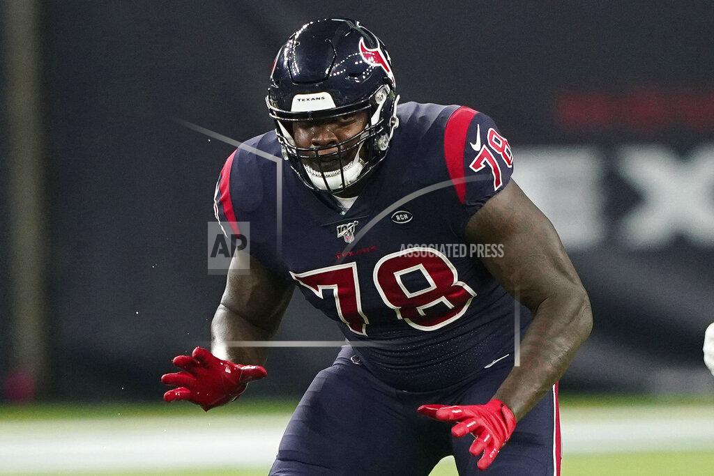 FILE - In this Nov. 21, 2019, file photo, Houston Texans offensive tackle Laremy Tunsil (78) is shown during the first half of an NFL football game against the Indianapolis Colts in Houston. The Houston Texans have signed left tackle Laremy Tunsil to a three-year, $66 million contract extension. (AP Photo/David J. Phillip, File)
