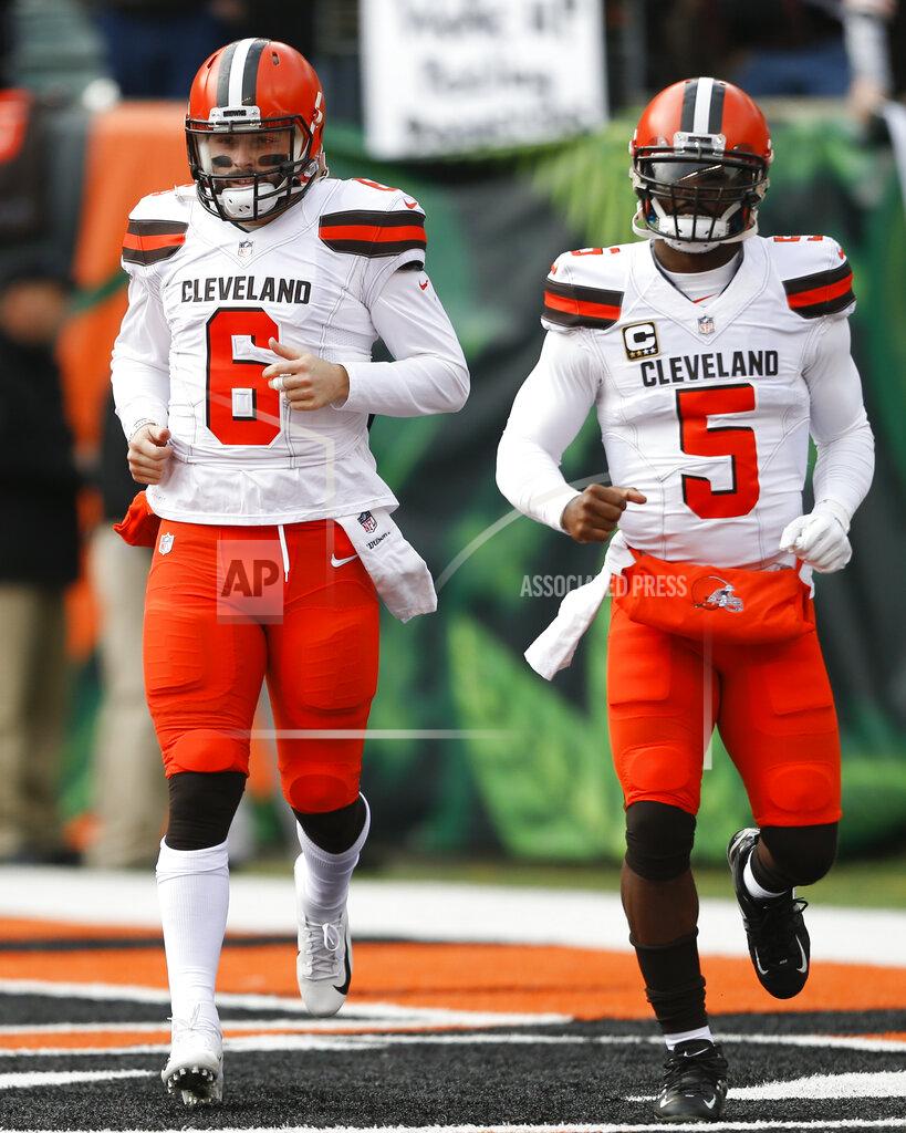 Gary Landers FILE - In this Nov. 25, 2018, file photo, Cleveland Browns quarterbacks Baker Mayfield (6) and Tyrod Taylor (5) warm up before an NFL football game against the Cincinnati Bengals in Cincinnati. When Cleveland fans fill FirstEnergy Stadium on Sunday for the first time in nearly two years, they'll see several familiar faces on Houston's roster, including Taylor, who was briefly the Browns' starter when Mayfield was a rookie in 2018. (AP Photo/Gary Landers, File)