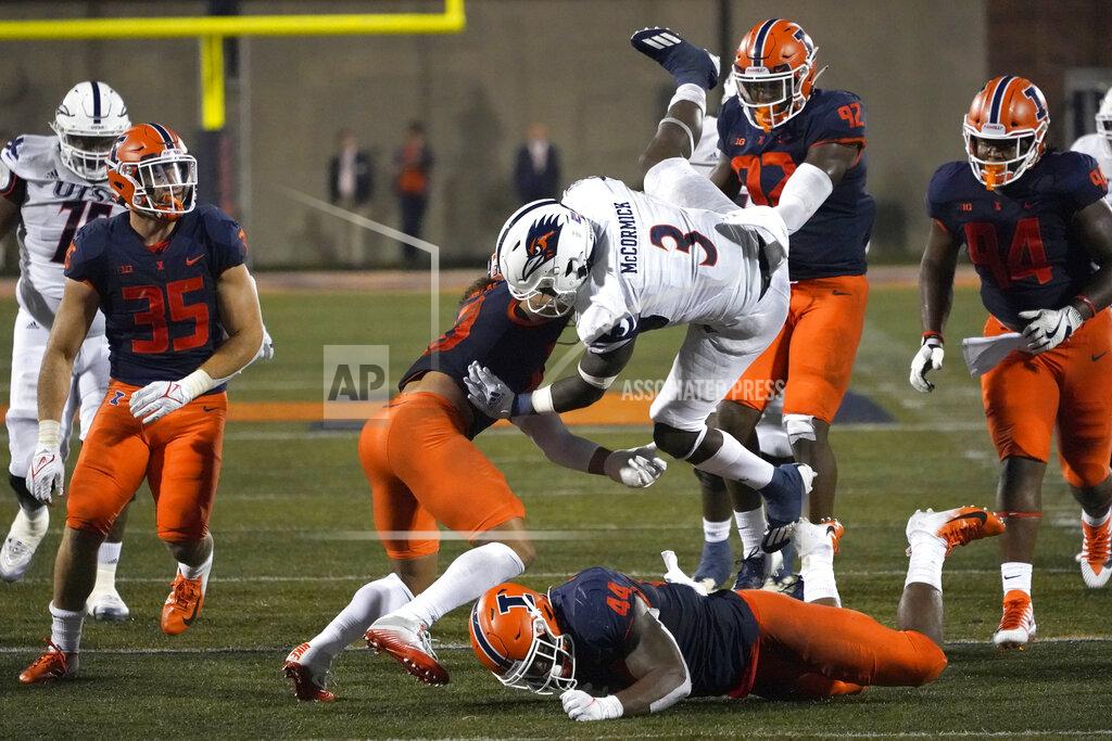Charles Rex Arbogast UTSA running back Sincere McCormick (3) is upended by Illinois defensive back Sydney Brown (30) during the first half of an NCAA college football game Saturday, Sept. 4, 2021, in Champaign, Ill. (AP Photo/Charles Rex Arbogast)