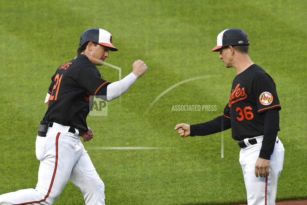 Terrance Williams Baltimore Orioles' Austin Hays (21) is greeted by third base coach Tony Mansolino (36) after hitting a first-inning home run against New York Yankees starting pitcher Corey Kluber during a baseball game on Friday, May 14, 2021, in Baltimore. (AP Photo/Terrance Williams)