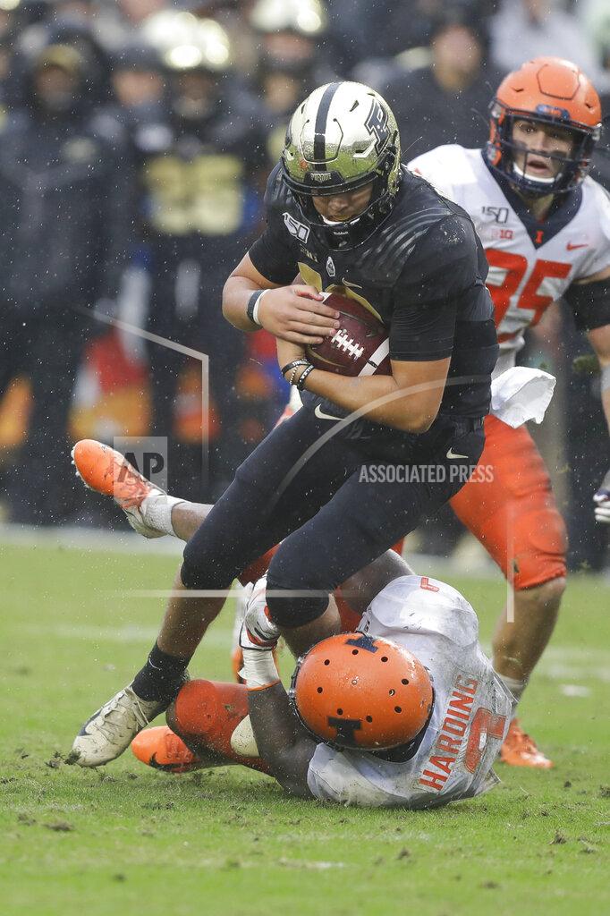 Darron Cummings Purdue quarterback Aidan O'Connell (16) is tackled by Illinois linebacker Dele Harding (9) during the second half of an NCAA college football game, Saturday, Oct. 26, 2019, in West Lafayette, Ind. (AP Photo/Darron Cummings)