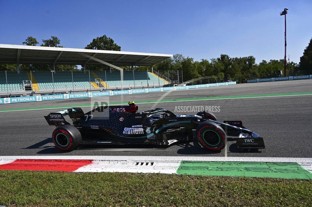 Miguel Medina Mercedes driver Valtteri Bottas of Finland steers his car during the qualifying session at the Monza racetrack in Monza, Italy, Saturday, Sept.5, 2020. The Italian Formula One Grand Prix will be held on Sunday. (Miguel Medina, Pool via AP)