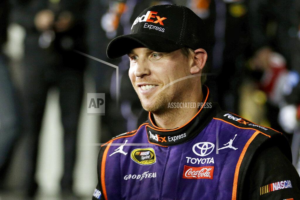 John Raoux FILE - In this Feb. 13, 2016, file photo, Denny Hamlin smiles during an interview after he won the NASCAR Sprint Unlimited auto race at Daytona International Speedway in Daytona Beach, Fla. Hamlin closed NASCAR's iRacing Series virtual auto race with a victory at a simulation of throwback North Wilkesboro Speedway on Saturday, May 9, 2020. (AP Photo/John Raoux, File)