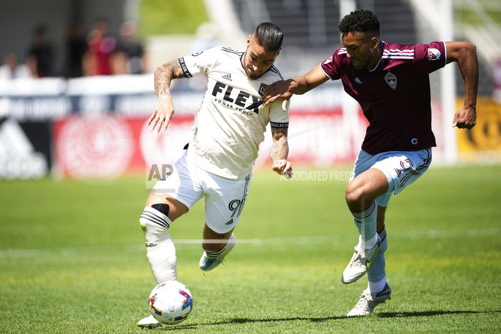 David Zalubowski Los Angeles FC forward Cristian Arango, left, drives past Colorado Rapids defender Auston Trusty in the first half of an MLS soccer match Saturday, May 14, 2022, in Commerce City, Colo. (AP Photo/David Zalubowski)