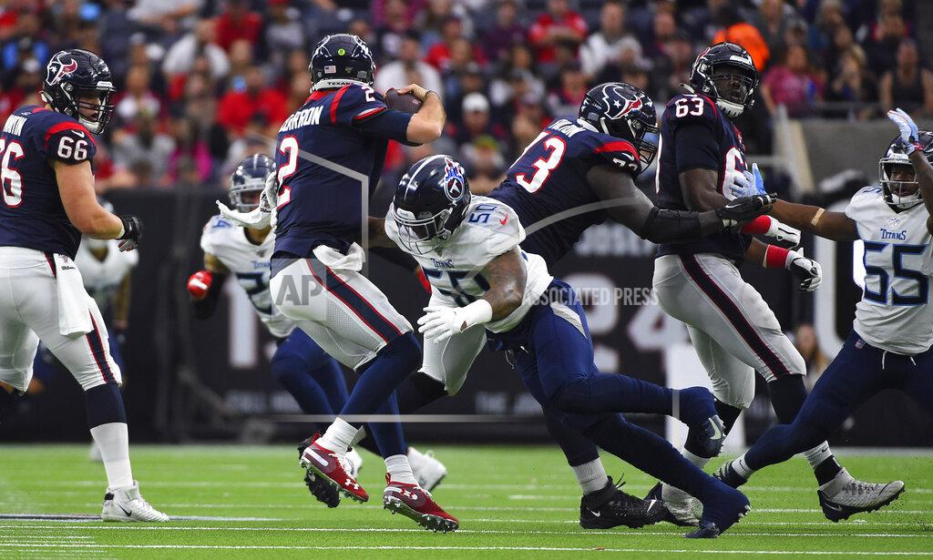 Eric Christian Smith Houston Texans quarterback AJ McCarron (2) is sacked by Tennessee Titans linebacker Derick Roberson (50) during the first half of an NFL football game Sunday, Dec. 29, 2019, in Houston. (AP Photo/Eric Christian Smith)