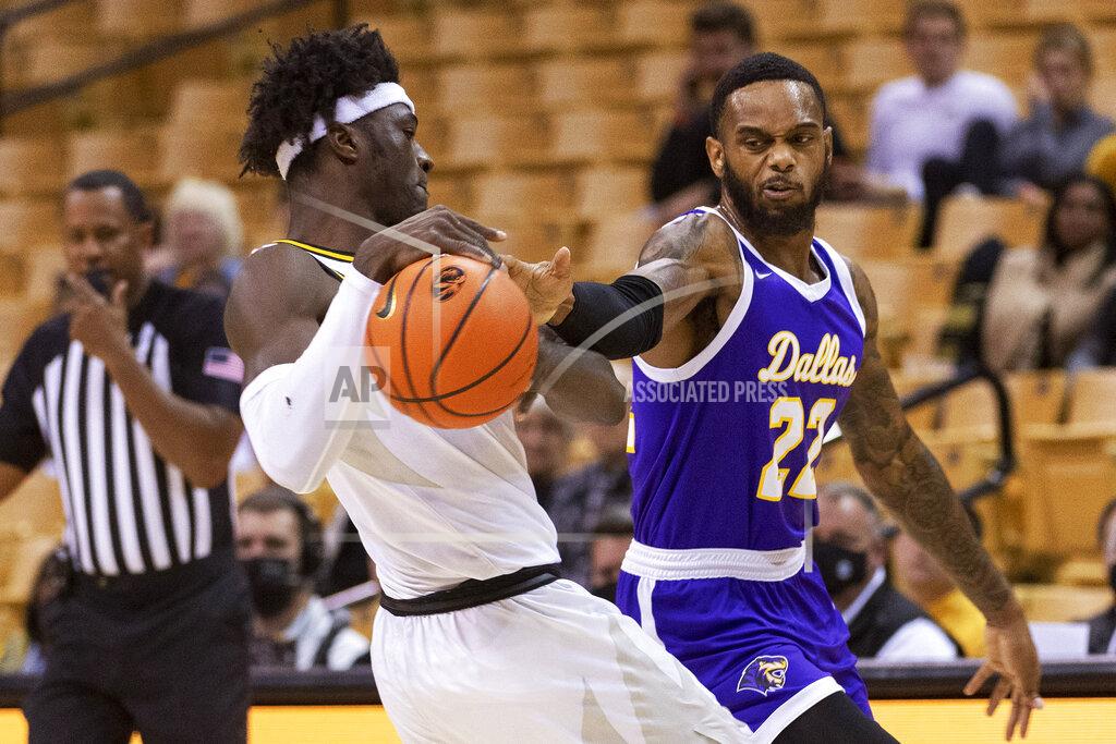L.g. Patterson Paul Quinn's Quintin Hudson, right, knocks the ball away from Missouri's Yaya Keita, left, during the first half of an NCAA college basketball game Monday, Nov. 29, 2021, in Columbia, Mo. (AP Photo/L.G. Patterson)