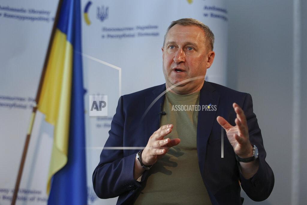Michal Dyjuk Ukrainian Ambassador to Poland, Andrii Deshchytsia, speaks during an interview with The Associated Press in Warsaw, Poland, Friday, May 20, 2022. Ukraine's ambassador to neighboring Poland says his country is grateful for the welcome that Poles have given to millions of Ukrainians, but hopes the European Union will soon release billions of euros to Poland so that helping those fleeing the war does not come “at the cost of the Polish people.” Ambassador Andrii Deshchytsia said that while there have been no real social tensions in the three months since Ukrainians began crossing into Poland seeking safety, he worries they could appear in the future given how much Poland has done. (AP Photo/Michal Dyjuk)