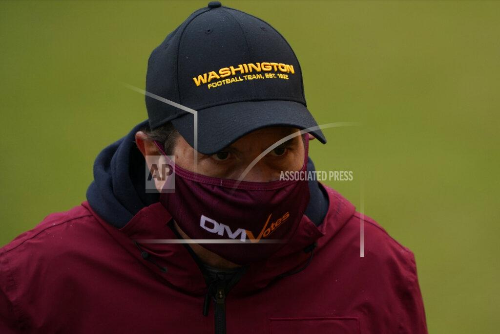 Susan Walsh Washington Football Team owner Dan Snyder, walking off the field before the start of an NFL football game against Dallas Cowboys, Sunday, Oct. 25, 2020, in Landover, Md. (AP Photo/Susan Walsh)