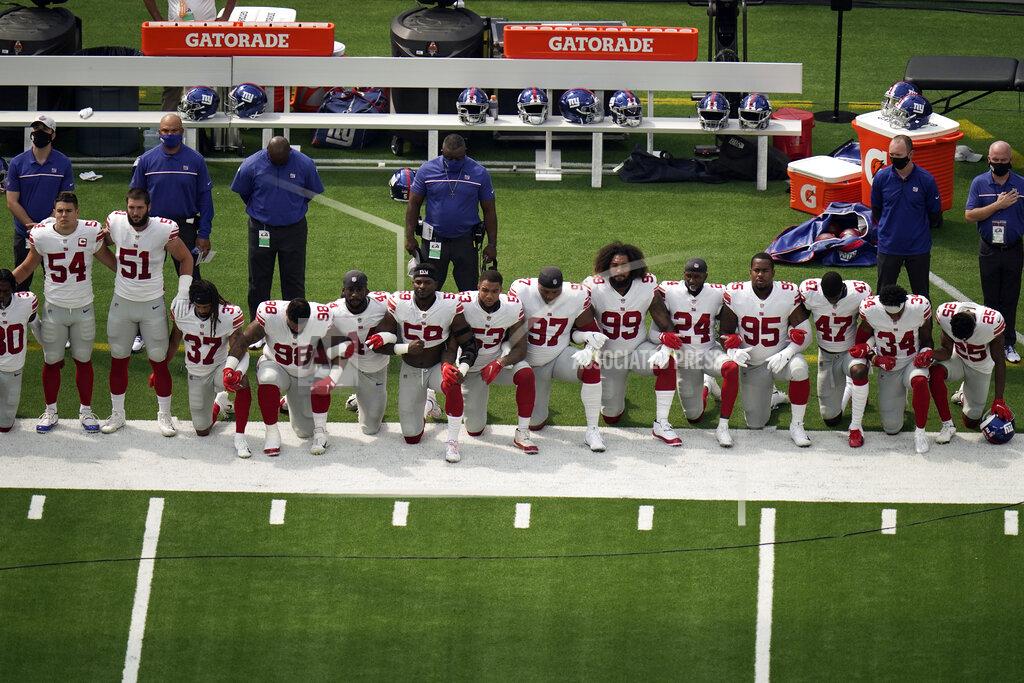 Jae C. Hong New York Giants players kneel during the national anthem before an NFL football game against the Los Angeles Rams Sunday, Oct. 4, 2020, in Inglewood, Calif. (AP Photo/Jae C. Hong)