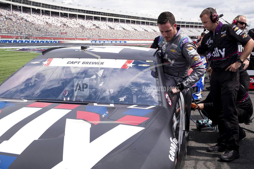 Ben Gray Alex Bowman climbs into his car before qualifying in seventh position for the NASCAR Cup Series auto race at Charlotte Motor Speedway on Saturday, May 29, 2021 in Charlotte, N.C. (AP Photo/Ben Gray)