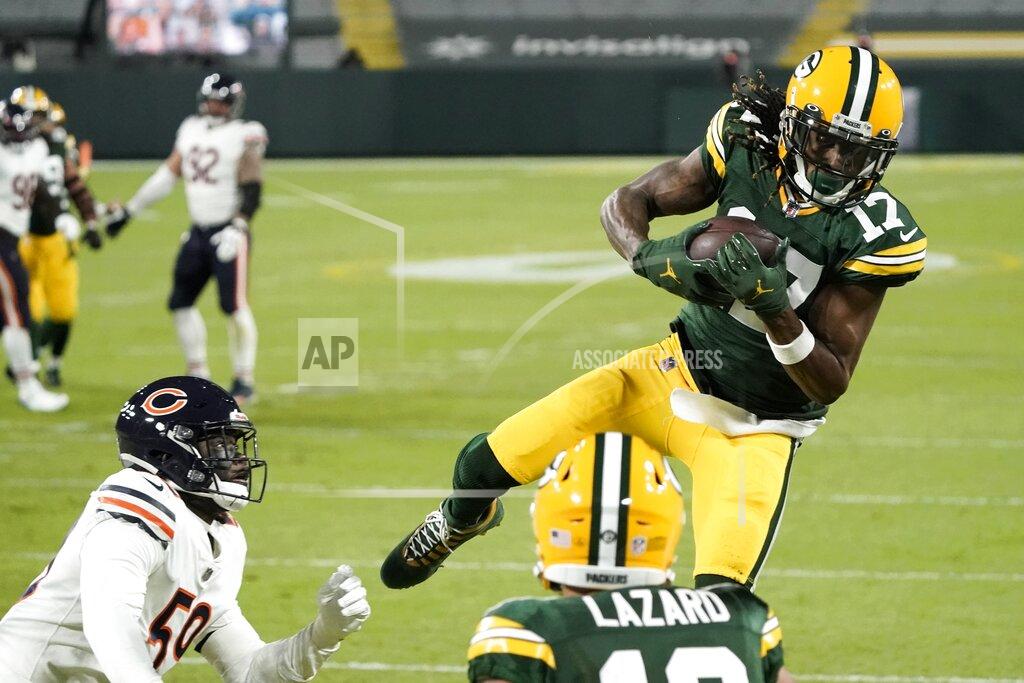 Morry Gash Green Bay Packers' Davante Adams catches a touchdown pass during the first half of an NFL football game against the Chicago Bears Sunday, Nov. 29, 2020, in Green Bay, Wis. (AP Photo/Morry Gash)