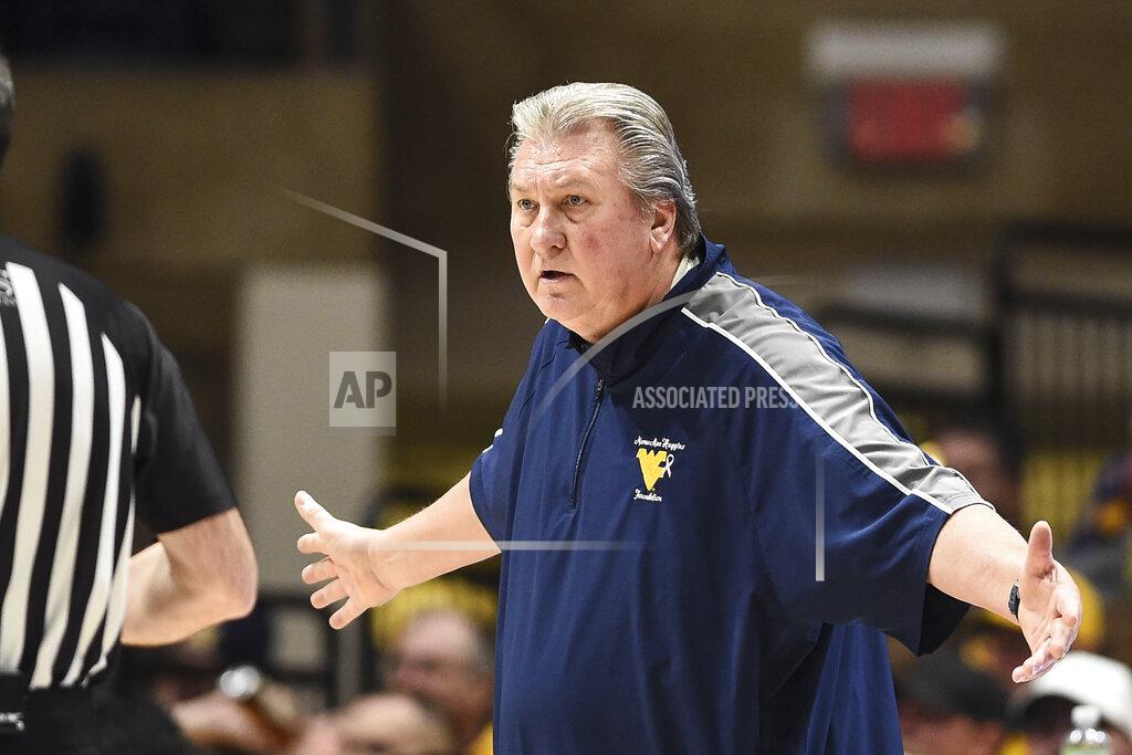 William Wotring West Virginia head coach Bob Huggins reacts to a play during the first half of an NCAA college basketball game against Baylor in Morgantown, W.Va., Tuesday, Jan. 18, 2022. (William Wotring)