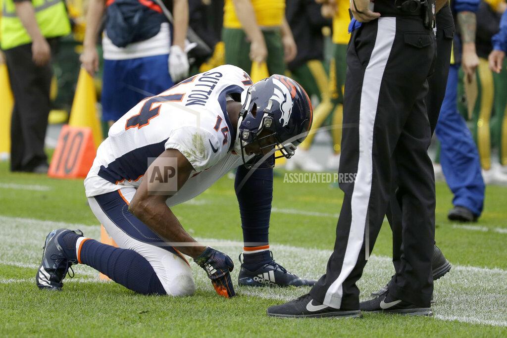 Mike Roemer Denver Broncos wide receiver Courtland Sutton pleads with an official that his feet were in bounds after making a catch during the second half of an NFL football game against the Green Bay Packers, Sunday, Sept. 22, 2019, in Green Bay, Wis. (AP Photo/Mike Roemer)