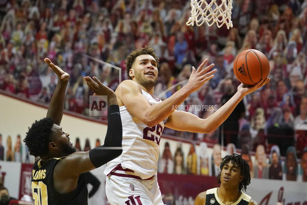 Darron Cummings Indiana's Race Thompson shoots next to Purdue's Trevion Williams (50) during the second half of an NCAA college basketball game Thursday, Jan. 14, 2021, in Bloomington, Ind. Purdue won 81-69. (AP Photo/Darron Cummings)