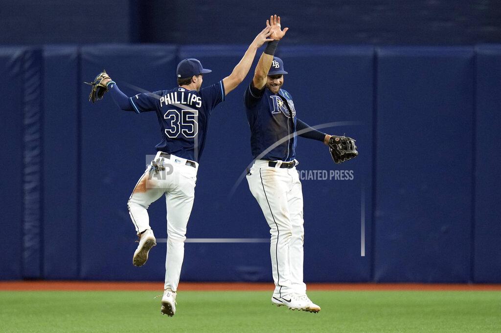 Chris O'MEara Tampa Bay Rays right fielder Brett Phillips (35) and center fielder Kevin Kiermaier (39) celebrate after the team defeated the Detroit Tigers during a baseball game Tuesday, May 17, 2022, in St. Petersburg, Fla. (AP Photo/Chris O'Meara)
