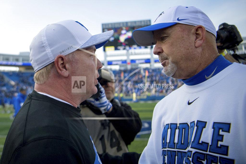 Bryan Woolston Kentucky head coach Mark Stoops speaks with Middle Tennessee head coach Rick Stockstill after an NCAA college football game against Kentucky in Lexington, Ky., Saturday, Nov. 17, 2018. Kentucky defeated Middle Tennessee 34-23. (AP Photo/Bryan Woolston)