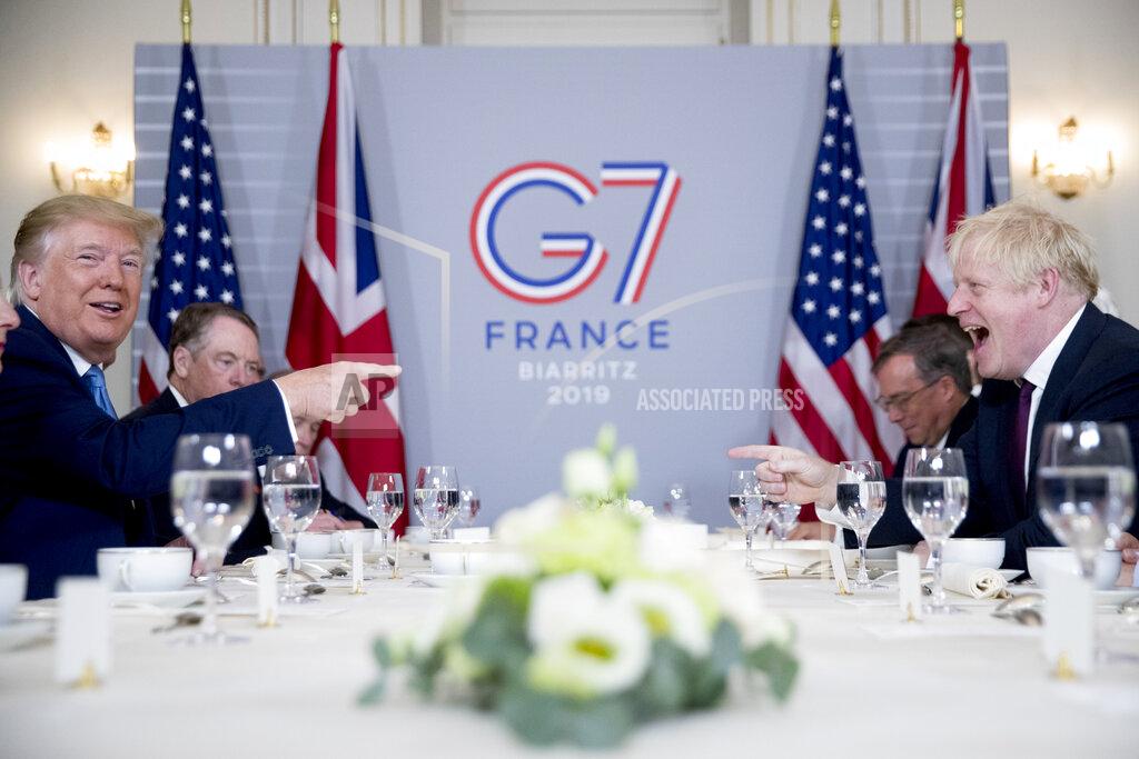 Andrew Harnik FILE - In this Aug. 25, 2019 file photo U.S. President Donald Trump, left, and Britain's Prime Minister Boris Johnson attend a working breakfast at the Hotel du Palais on the sidelines of the G-7 summit in Biarritz, France. If you're the leader of an increasingly isolated country, what's better — to keep an unreliable friend or gain a dependable critic? That's the dilemma facing British Prime Minister Boris Johnson over a U.S. election taking place weeks before the U.K. makes an economic split from the European Union at year's end and seeks new trade and diplomatic partners. (AP Photo/Andrew Harnik)