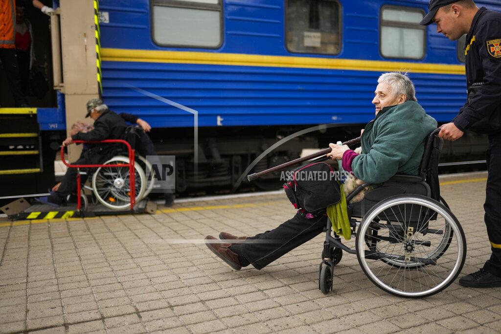 Francisco Seco People fleeing from heavy shelling board an evacuation train at Pokrovsk train station, in Pokrovsk, eastern Ukraine, Sunday, May 22, 2022. Civilians fleeing areas near the eastern front in the war in Ukraine Sunday described scenes of devastation as their towns and villages came under sustained attack from Russian forces. (AP Photo/Francisco Seco)