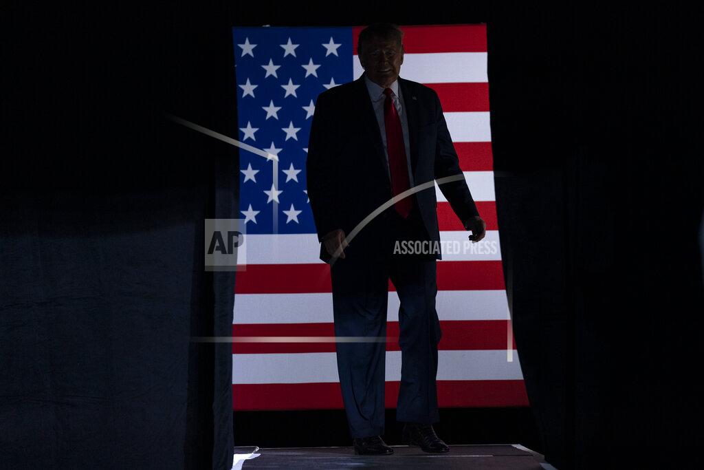 Evan Vucci President Donald Trump arrives on stage to speak at a campaign rally at the BOK Center, Saturday, June 20, 2020, in Tulsa, Okla. (AP Photo/Evan Vucci)