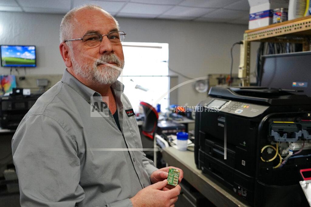 Samuel Metz Independent repair shop owner Curtis Jones poses at The Technology Center in Sparks, Nev., Tuesday, March 30,2021. Jones is among a group of independent repair shop owners who say tech companies have made it increasingly difficult to access parts and schematics needed to fix devices. He wants the state Legislature to pass a "Right to Repair" bill that would require manufacturers provide independent repair shops the information needed to fix devices. (AP Photo/Samuel Metz)
