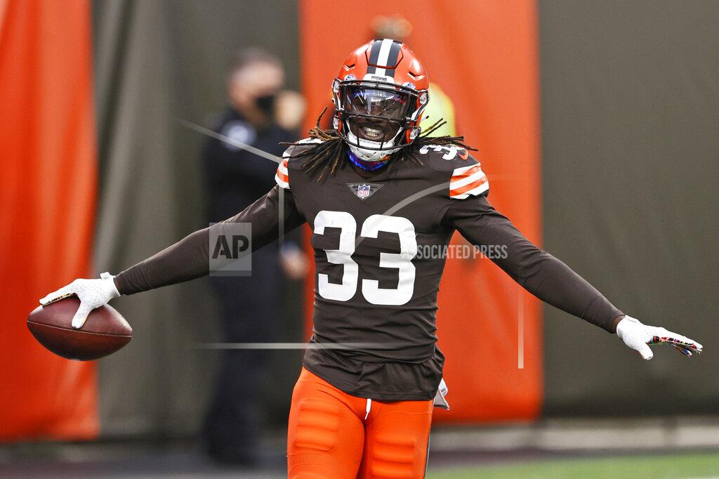 Ron Schwane Cleveland Browns defensive back Ronnie Harrison celebrates after a 47-yard interception return for a touchdown during the second half of an NFL football game against the Indianapolis Colts, Sunday, Oct. 11, 2020, in Cleveland. (AP Photo/Ron Schwane)