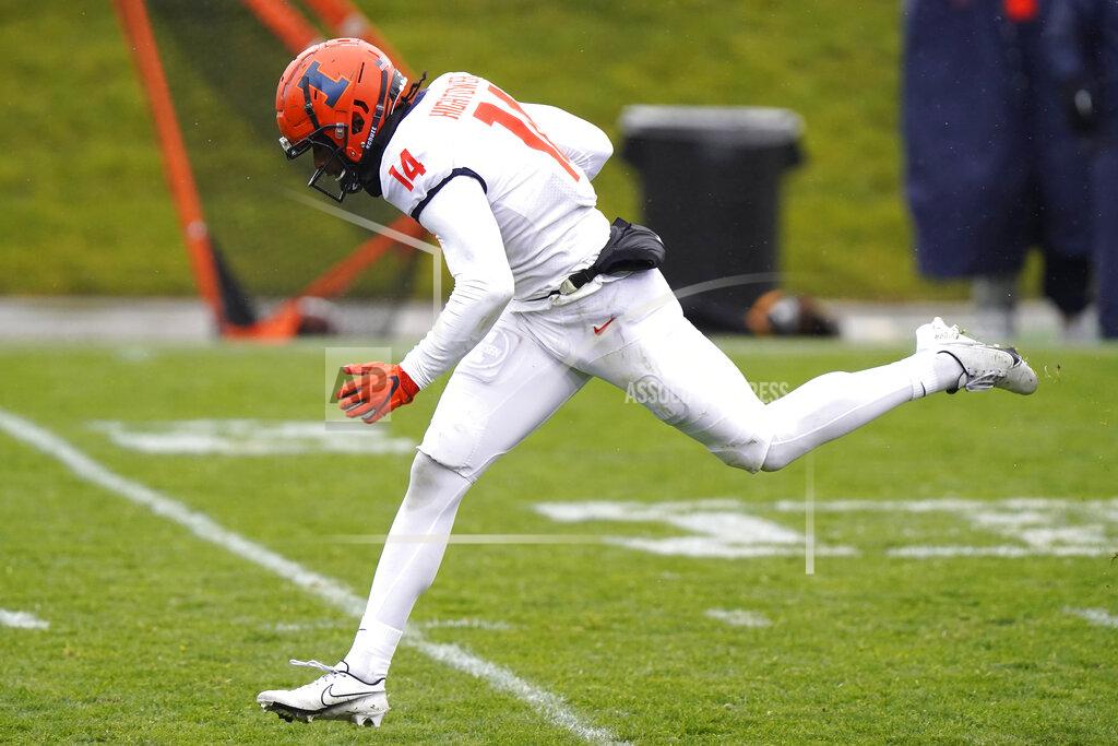 Nam Y. Huh Illinois wide receiver Brian Hightower runs with the ball for a touchdown during the second half of an NCAA college football game against Northwestern in Evanston, Ill., Saturday, Dec. 12, 2020. Northwestern won 28-10. (AP Photo/Nam Y. Huh)