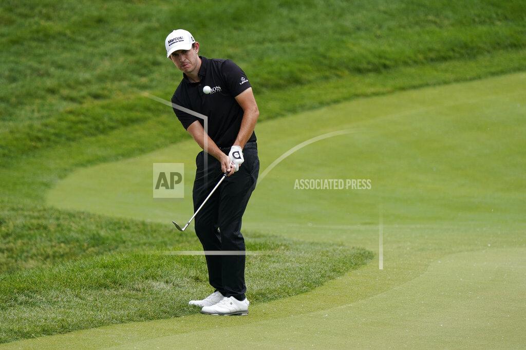 Darron Cummings Patrick Cantlay hits to the fourth green during the final round of the Memorial golf tournament, Sunday, June 6, 2021, in Dublin, Ohio. (AP Photo/Darron Cummings)