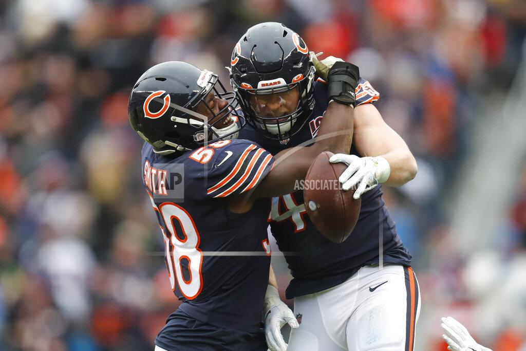 Charles Rex Arbogast Chicago Bears inside linebacker Nick Kwiatkoski (44) celebrates his interception with Roquan Smith (58) during the second half of an NFL football game against the Detroit Lions in Chicago, Sunday, Nov. 10, 2019. (AP Photo/Charles Rex Arbogast)